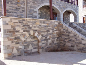 Detail showing the stonework terrace wall and stairs