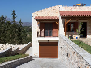 Laid stone drive and basement garage