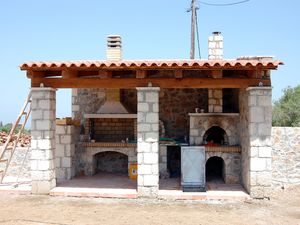 Outdoor kitchen and BBQ area.