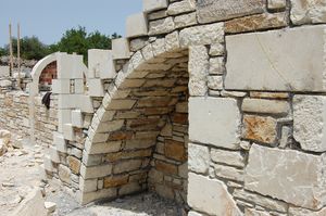 External stairs and quarter arch.