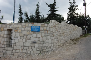 Stone boundary wall.