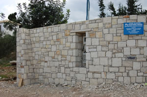 Stone boundary wall.