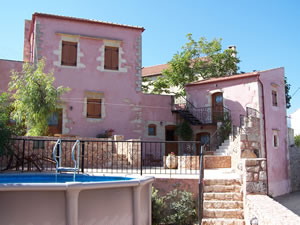 Two rendered stone villas